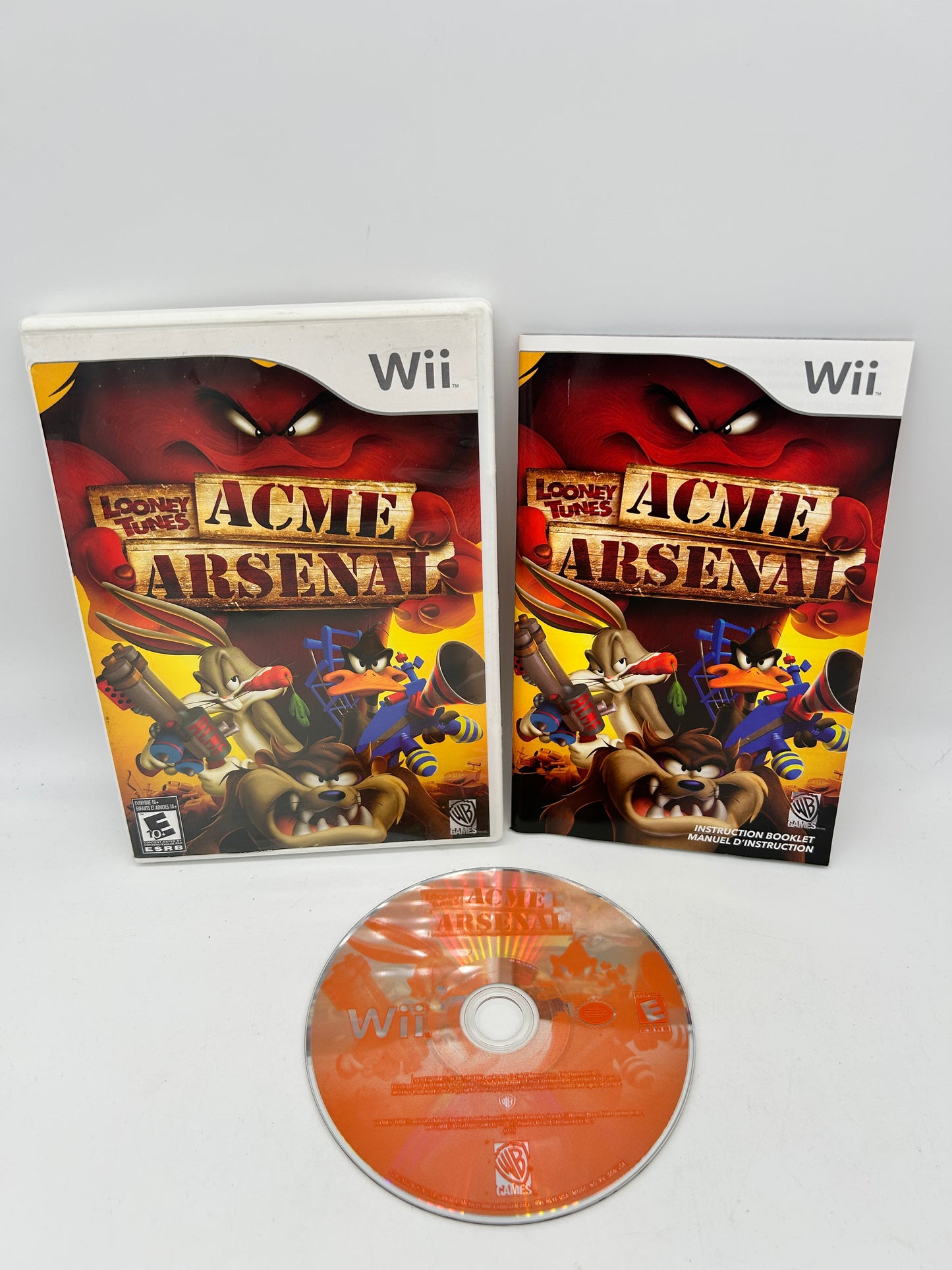 PiXEL-RETRO.COM : NINTENDO WII COMPLET CIB BOX MANUAL GAME NTSC LOONEY TUNES ACME ARSENAL