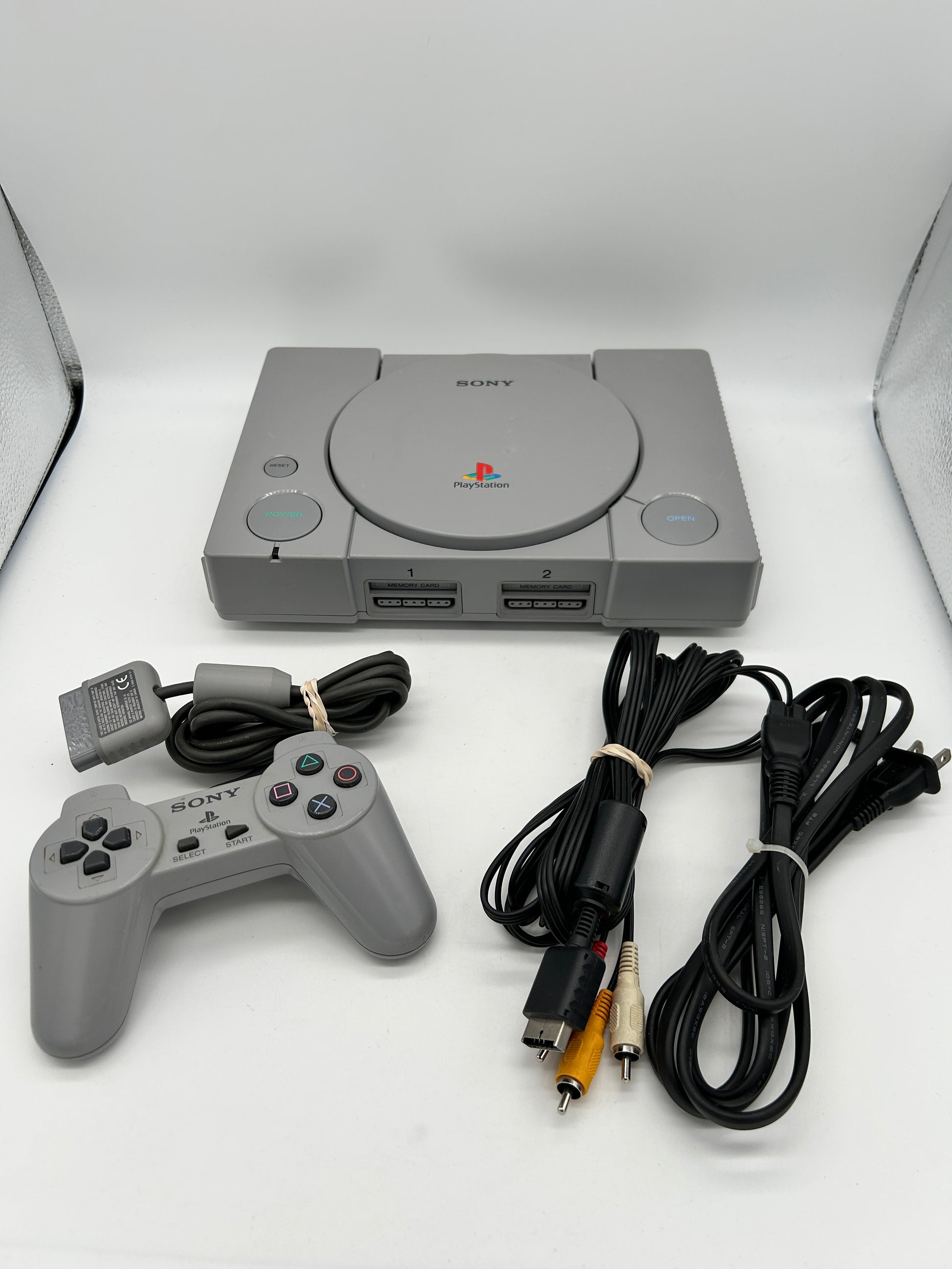 PiXEL-RETRO.COM : SONY PLAYSTATION 1 ORIGINAL GRAY VERSION, CONTROLLER, POWER SUPPLY, RCA CABLE NTSC