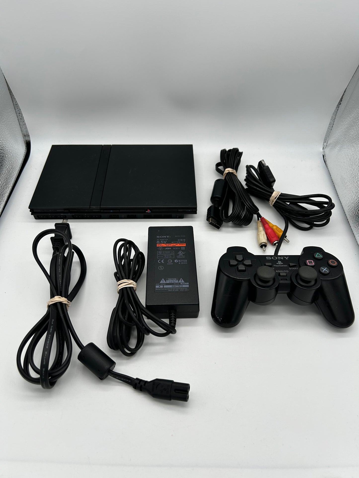 PiXEL-RETRO.COM : SONY PLAYSTATION 2 ORIGINAL SLIM BLACK VERSION, CONTROLLER, POWER SUPPLY, RCA CABLE NTSC SCPH-75001