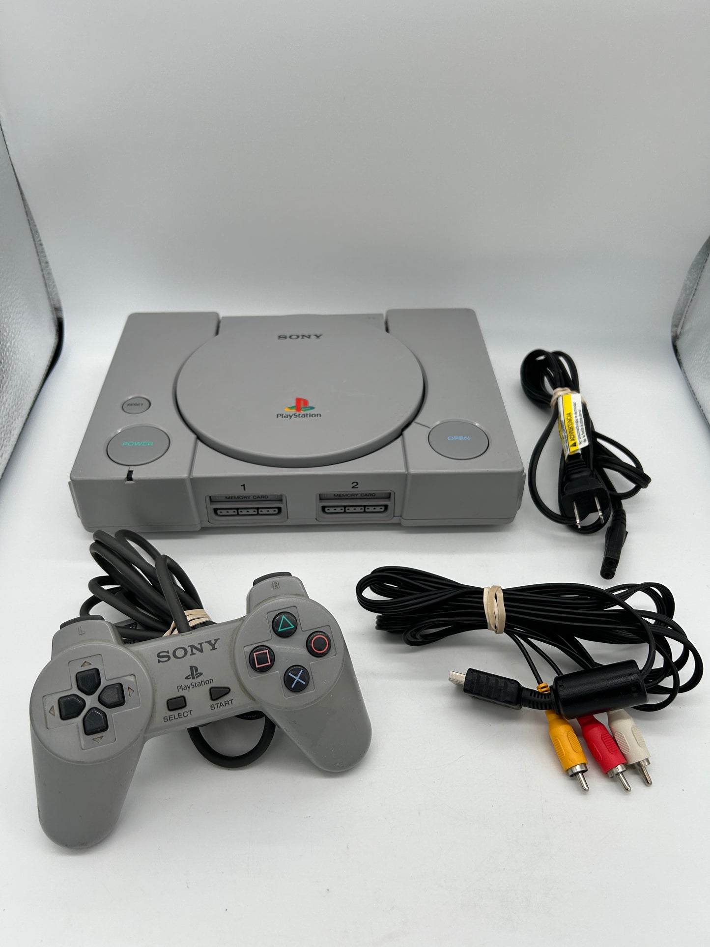 PiXEL-RETRO.COM : SONY PLAYSTATION 1 ORIGINAL GRAY VERSION, CONTROLLER, POWER SUPPLY, RCA CABLE SCPH-9001 NTSC
