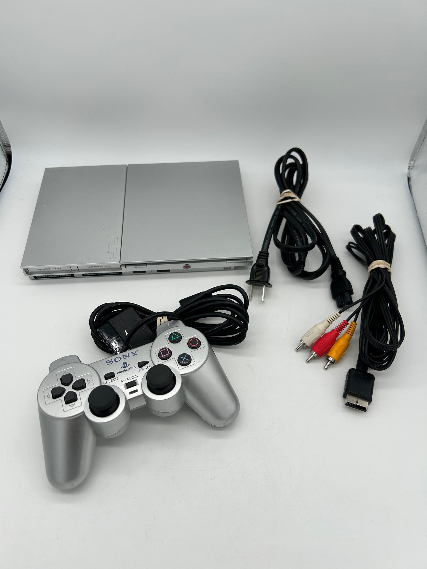 PiXEL-RETRO.COM : SONY PLAYSTATION 2 ORIGINAL SLIM SILVER PLATINUM VERSION, CONTROLLER, POWER SUPPLY, RCA CABLE NTSC SCPH-90001