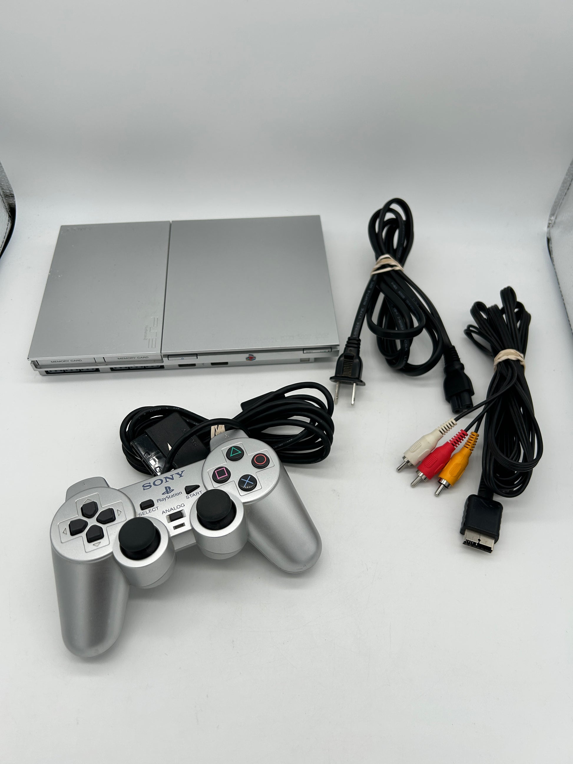 PiXEL-RETRO.COM : SONY PLAYSTATION 2 ORIGINAL SLIM SILVER PLATINUM VERSION, CONTROLLER, POWER SUPPLY, RCA CABLE NTSC SCPH-90001