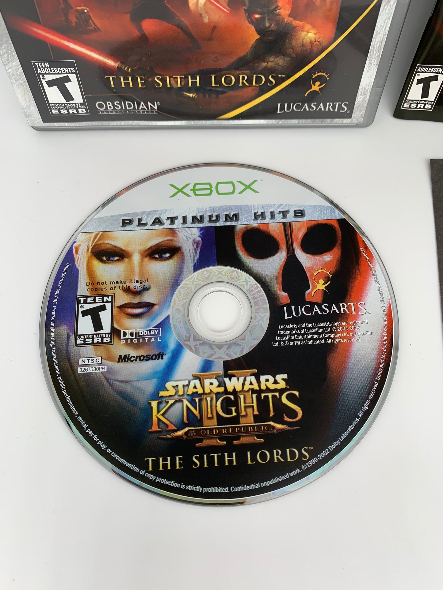 MiCROSOFT XBOX ORiGiNAL | STAR WARS KNiGHTS OF THE OLD REPUBLiC II THE SiTH LORDS | PLATiNUM HiTS